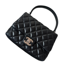 Load image into Gallery viewer, Chanel Mini Kelly in black lambskin leather with silver hardware
