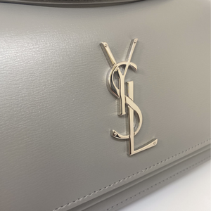 CLOSE UP OF SUNSET BAG BY SAINT LAURENT AVAILABLE TO RENT