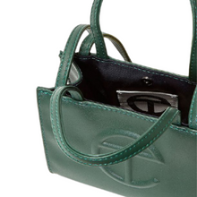 Load image into Gallery viewer, Inside of the Telfar Unisex Shopping Bag small in dark green available to rent
